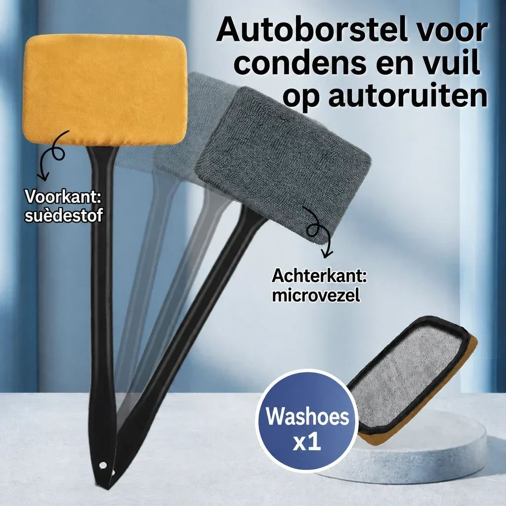 Close-up van een doek die condens van een autoruit verwijdert